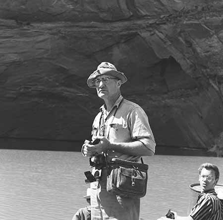 Dan Luten on raft on lake