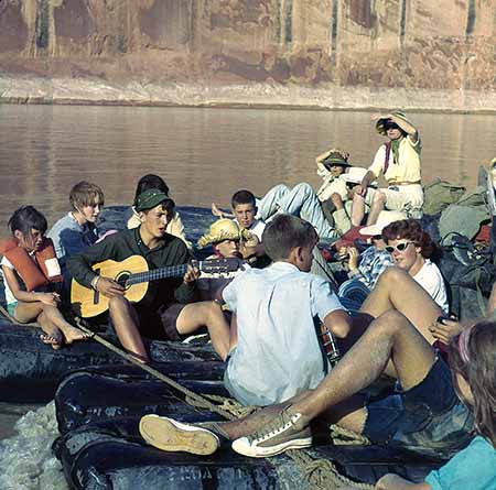 People on Raft Singing